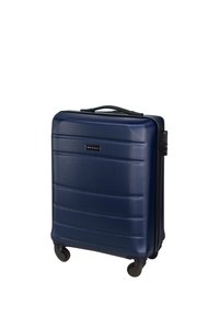 Navy hard-shell suitcase with textured surface, horizontal grooves, retractable handle, and four wheels for mobility.