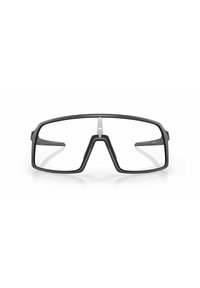 Occhiali da vista neri rettangolari con una montatura geometrica ampia, dotati di un ponte distintivo e di aste sottili. Lenti trasparenti. Finitura opaca.