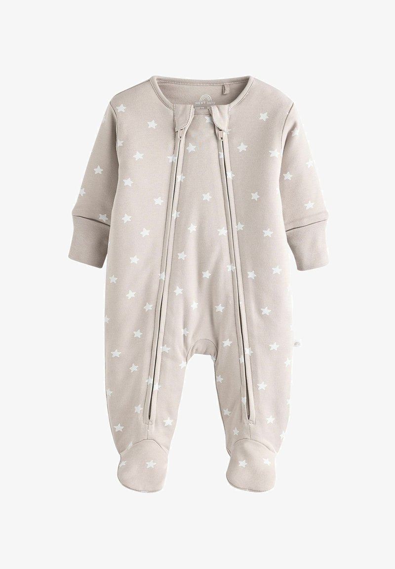 Bežinis kūdikio kombinezonas su ilgomis rankovėmis, turintis baltas žvaigždžių raštas, užtrauktuko priekį ir padas, kad būtų šilta.