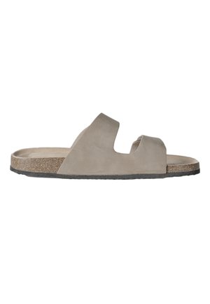 Sandalia beige sin cordones con dos tiras anchas, plantilla de corcho y suela de goma negra, vista lateral sobre fondo blanco.