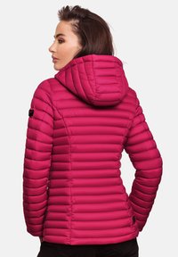 Fuchsia puffer jacket with horizontal quilted texture, fitted design, attached hood, and a black logo patch on the left sleeve.