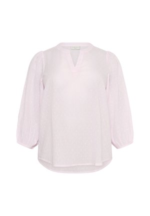 Blouse rose clair à coupe décontractée, avec des manches bouffantes, un décolleté en V et un motif texturé à pois. Tissu doux et léger.