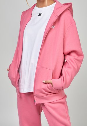 Vetoketjullinen college - pink