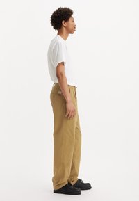 Levi's® - Chinosy