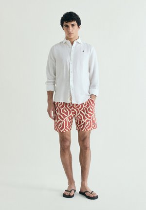 Scalpers, SCALPERS GEOMETRIC LEAVES SWIMSUIT - Badeshorts - terracotta