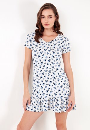 Floral dress with short sleeves, white base and light blue flowers. Features a V-neckline and a ruffled hem. Made from lightweight fabric.