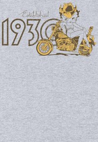 Gráfico de color gris claro que presenta una motocicleta y un personaje con un sombrero de vaquero. El texto "Establecido en 1930" aparece en marrón y amarillo.