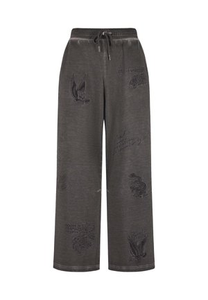 Donkergrijze sweatpants met een elastische tailleband, voorzien van geborduurde graphics van adelaars, schedels en tekst in verschillende formaten. Gladde textuur.