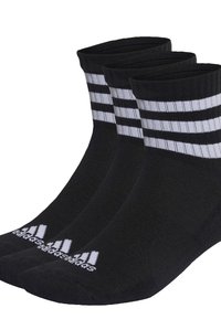 Calcetines deportivos negros con tres rayas blancas en el puño y un logo en blanco, fabricados con un material texturizado y transpirable.