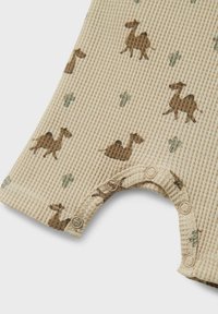 Beige ribbad bodysuit med tryck av kamel och kaktus. Knäppning vid benöppningen är i kontrasterande beige och gröna nyanser.