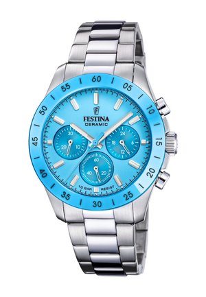 Stříbrné kovové náramkové hodinky s jasně modrým ciferníkem, třemi podciferníky, luminiscenčními ručičkami a otočnou lunetou označenou minutovými ukazateli.