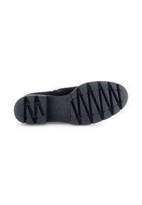 Zwarte rubberen zool met multidirectionele groeven voor grip. Heeft een reliëf "Gabor" logo. Schoenontwerp geschikt voor verschillende activiteiten.