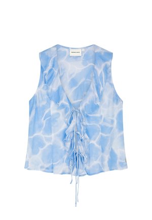 Sleeveless blue and white tie-dye blouse with V-neck, ruffled front trim, and three tied bows down the center.