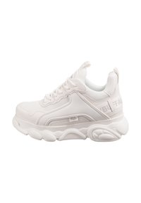 White athletic shoe featuring a textured mesh upper, padded tongue, and chunky sole with distinct curves. Subtle branding on the side.