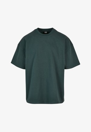 Tmavě zelené oversized bavlněné tričko s kulatým výstřihem, volnými rukávy a rovnými lemy. Minimalistický design, měkká textura.