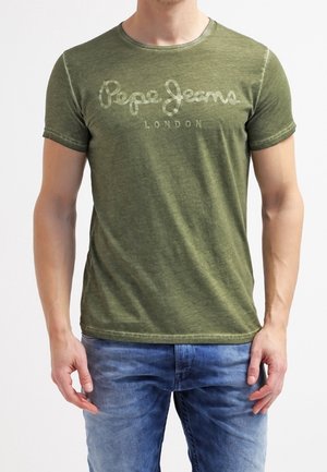 Oliivivihreä puuvillapaita pyöreällä kaula-aukolla; "Pepe Jeans London" -logo painettuna etupuolelle vaaleammalla sävyllä; lyhyet hihat.