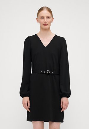 Black dress with a V-neck, long puffed sleeves, and a belted waist featuring silver hardware and eyelets. Smooth, mid-length fabric.