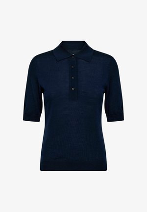 Camisa polo de manga corta azul marino con cuatro botones negros y cuello clásico, exhibida sobre un fondo blanco.