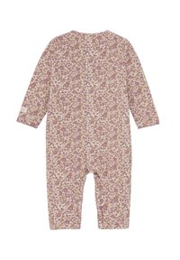 Langärmliger Einteiler in hellrosa mit einem floralen Muster in Lila und Gelb. Weicher Stoff mit gewellten Säumen an den Ärmelenden und am Ausschnitt.