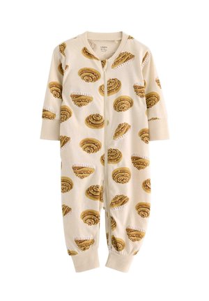 Giocattolo per bambini di colore crema con un motivo di rotoli di cannella, dotato di chiusura con zip e maniche lunghe. Realizzato in tessuto morbido.