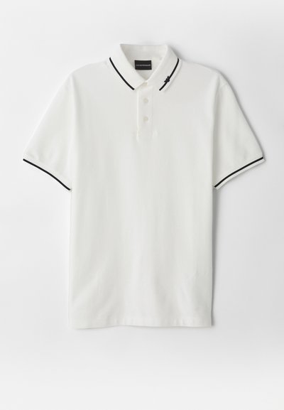 White polo shirt with a three-button placket, black trim on the collar and sleeves, made from soft cotton fabric. Simple design, no patterns.