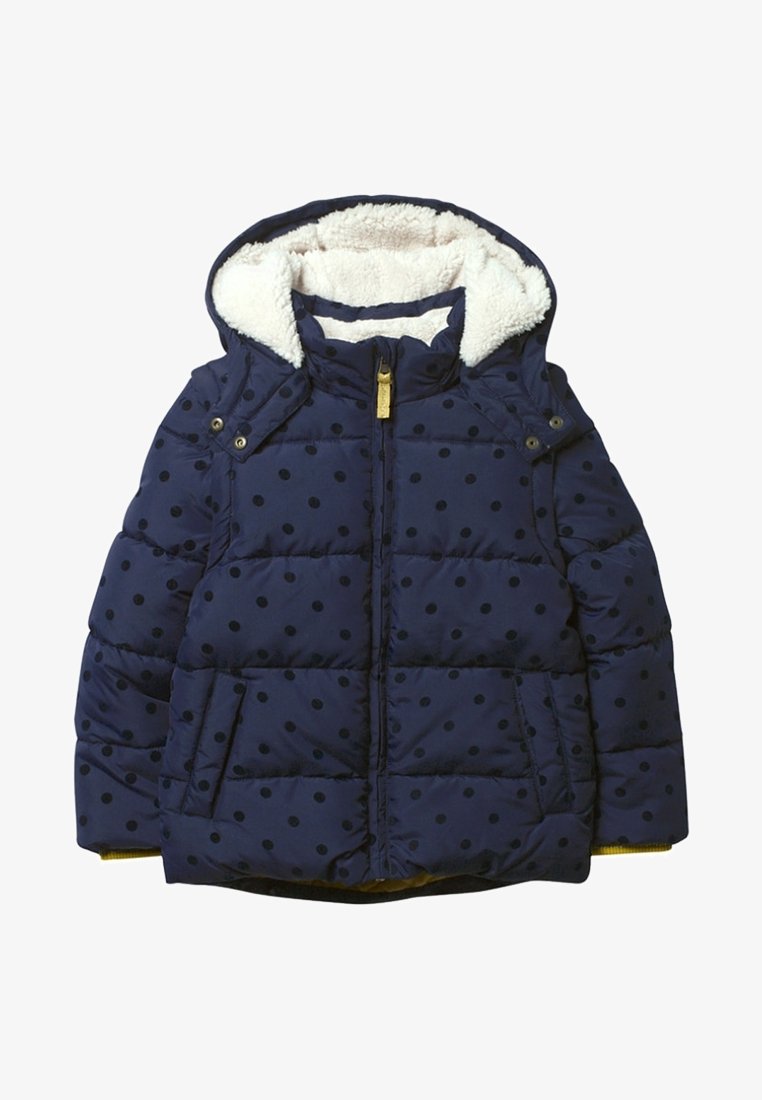 Navy puffer jacket with white faux fur lining, polka dot pattern, front zipper, side pockets, and a detachable hood. Accented with gold hardware.