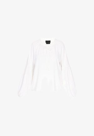 White blouse with a rounded neckline, drawstring tie, and long, puffed sleeves. Fabric appears soft, with a relaxed fit and minimal detailing.
