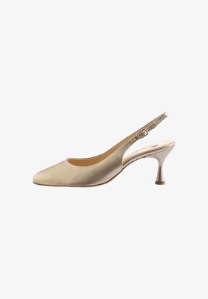 Gold, satin slingback shoe with a pointed toe and a kitten heel. Features a small buckle and a cut-out heel design. Smooth texture.