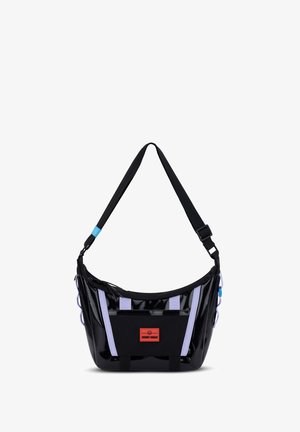 Black glossy shoulder bag with lavender accent straps, adjustable black strap, red logo patch, and textured front pocket.