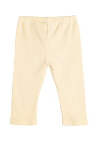 Leggings de color amarillo claro con textura acanalada, confeccionados en suave algodón, con una cinturilla elástica y corte recto, que presentan bordes rematados.