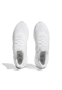 White athletic shoes with a breathable mesh upper, lace-up design, three stripe accents, and textured details on the sole.
