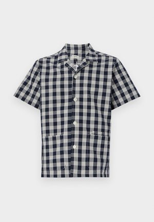Skjorte med korte ermer i marineblå og hvit rutete mønster, laget av myk stoff, med knapper foran og to lommer foran.