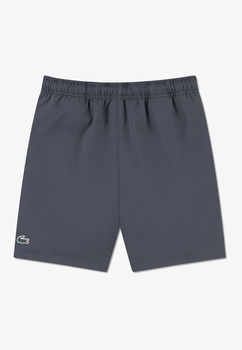 Tumedat hallid ujumispüksid elastse vöökohaga, millel on väike roheline ja punane logo. Valmistatud kergest, tekstuurse kangaga.