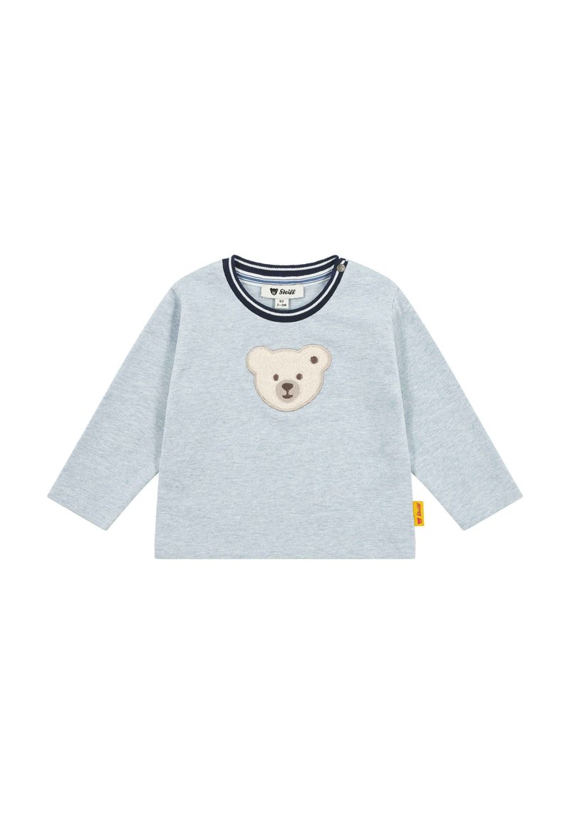 Helles graues Langarmshirt mit einem runden, navygestreiften Ausschnitt und einer Bärenkopf-Applikation auf der Vorderseite. Baumwollmaterial, weiche Textur.