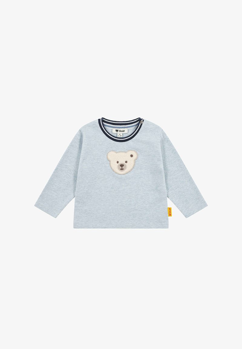 Light grey long-sleeve shirt with a round navy-striped neckline and a bear face appliqué on the front. Cotton material, soft texture.