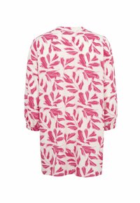 Bloemijke jurk met een lichte achtergrond en opvallende roze bladvormen, lange mouwen metGathered cuffs en een losse pasvorm.