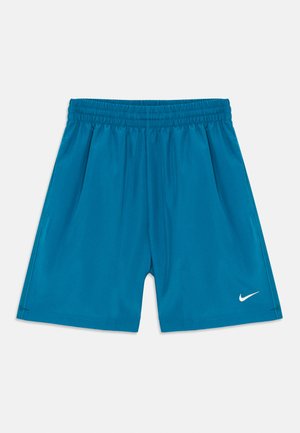 Kék sportnadrág, gumis derékkal és oldalsó zsebekkel, a jobb alsó lábon egy apró fehér Nike logóval.