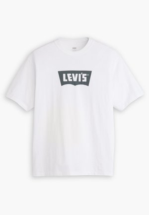 T-shirt en coton blanc à manches courtes avec un logo noir Levi's au centre et un col rond. Texture lisse, coupe standard.