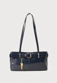 Navy leather handbag with two shoulder straps, a belt accent, and a gold keychain pendant. Smooth texture and structured, rectangular shape.