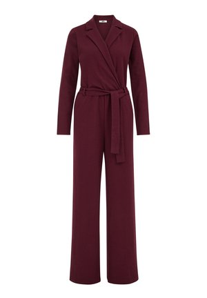 Burgundin jumpsuitissa on pitkät hihat, kauluspanta ja solmittava vyötärö. Se on valmistettu teksturoidusta kankaasta, jossa on leveät lahkeet.