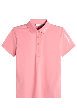Polo rosa de manga corta con tres botones, cuello y la marca blanca "J.LINDEBERG" en el cuello y la manga derecha.