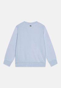 Lacoste Sweatshirt - bleu clair