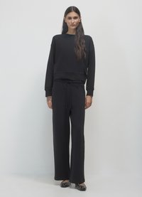 Calliope A PALAZZO IN - Jogginghose - ultrablack