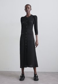 sandro TUILERIES - Robe pull - noir