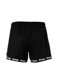 Shorts de sport noirs avec une taille élastique, arborant le logo "Kempa" en blanc sur l'ourlet et une texture de tissu lisse et léger.