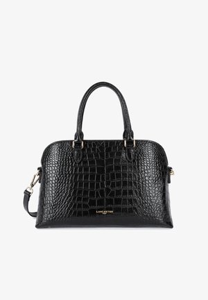Sac à main noir en cuir gaufré crocodile avec poignées doubles, quincaillerie dorée et bandoulière amovible. Texture lisse avec une forme structurée.
