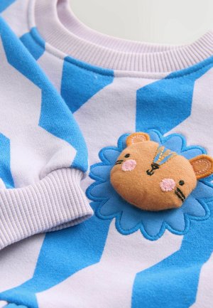 Blau-weißer Sweatshirt mit Zickzackmuster und strukturiertem Löwenmotiv in Orange und Blau. Gerippte Bündchen und Halsausschnitt.