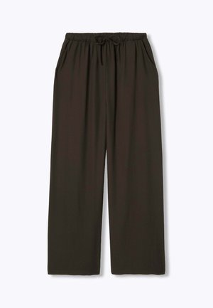 Pantalon ample vert olive foncé avec taille élastique et cordon, doté de poches latérales, présenté sur un fond clair uni.