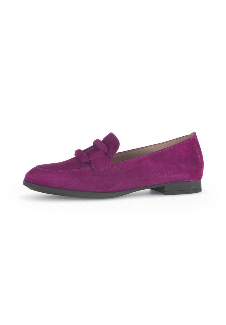 Purple suede loafers with a flat heel feature a bow accent on the front. The design is streamlined with a rounded toe and textured finish.