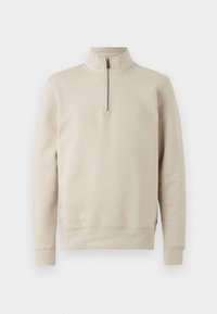 Beige pullover sweatshirt with a high collar and half-zip closure. Made of soft fabric with ribbed cuffs and waistband, featuring a smooth texture.
